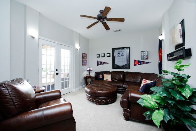 9303 Georgetown Glen Cir, Cypress, TX 77433 - living room featuring french doors, carpet flooring, and a ceiling fan