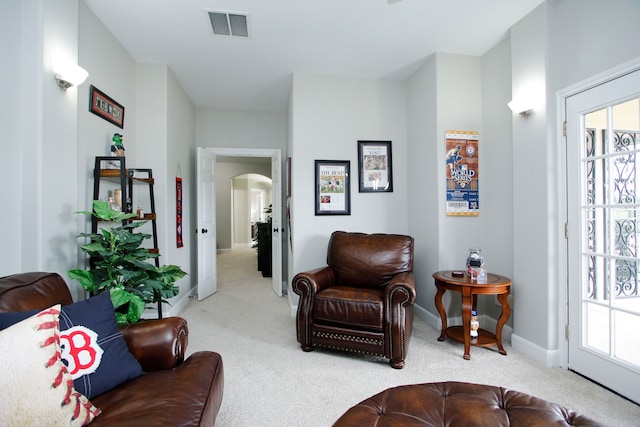 9303 Georgetown Glen Cir, Cypress, TX 77433 - living area with carpet, arched walkways, and plenty of natural light