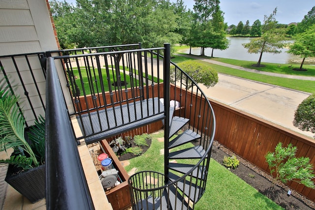 9303 Georgetown Glen Cir, Cypress, TX 77433 - balcony featuring a water view