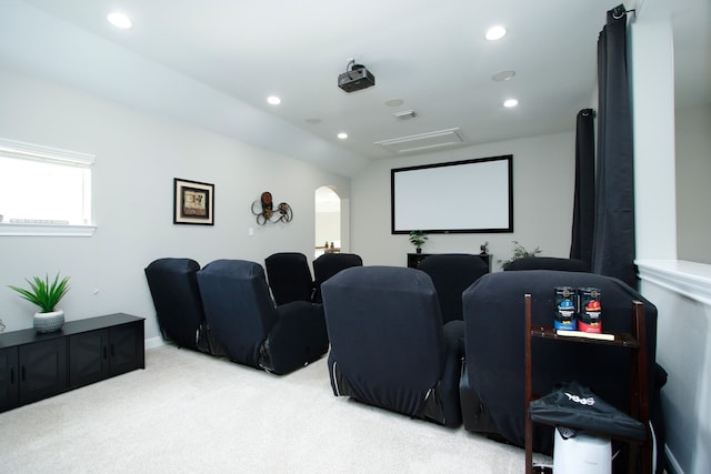 9303 Georgetown Glen Cir, Cypress, TX 77433 - home theater room with light colored carpet, arched walkways, and recessed lighting