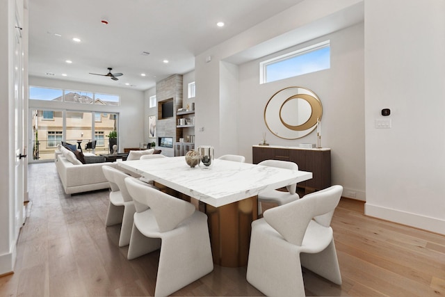 4705 Gibson St, Houston, TX 77007 - dining space with a ceiling fan, recessed lighting, and light wood-style floors
