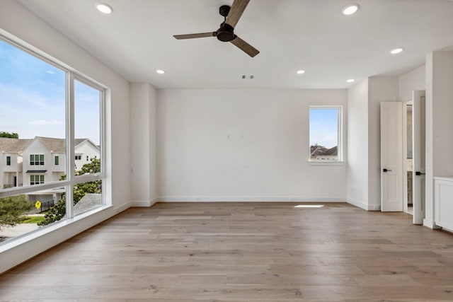 4705 Gibson St, Houston, TX 77007 - spare room with a ceiling fan, light wood finished floors, and recessed lighting