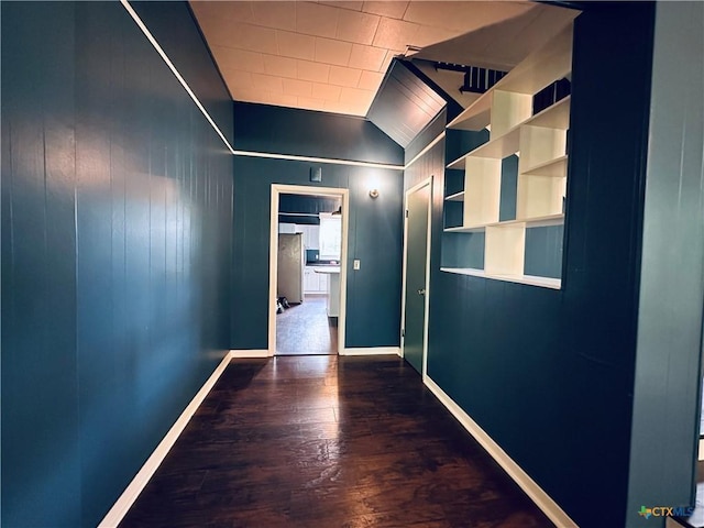 1002 E Gonzales St, Yoakum, TX 77995 - corridor featuring wood finished floors and baseboards