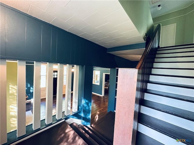 1002 E Gonzales St, Yoakum, TX 77995 - stairs featuring wood finished floors