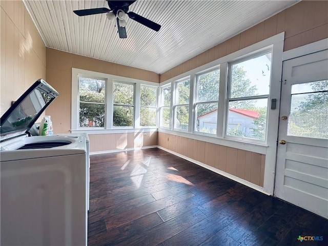 1002 E Gonzales St, Yoakum, TX 77995 - sunroom with washer / clothes dryer, hardwood / wood-style flooring, ceiling fan, healthy amount of natural light, and wood walls