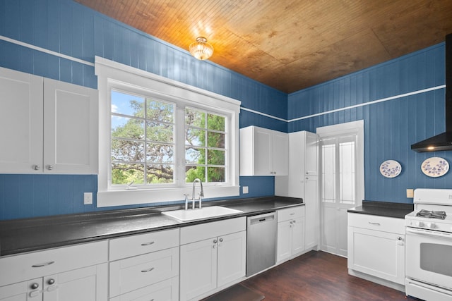 1002 E Gonzales St, Yoakum, TX 77995 - kitchen with white gas stove, dishwasher, dark countertops, wooden ceiling, and dark wood-style floors