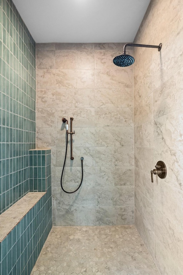 1002 E Gonzales St, Yoakum, TX 77995 - full bathroom featuring a tile shower