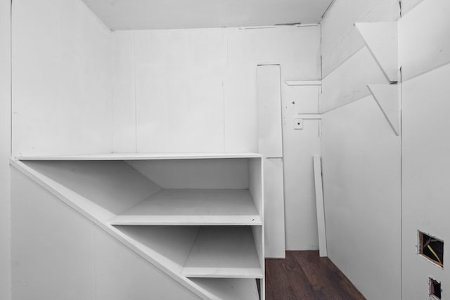 1002 E Gonzales St, Yoakum, TX 77995 - spacious closet featuring dark wood-style flooring