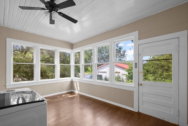 1002 E Gonzales St, Yoakum, TX 77995 - unfurnished sunroom featuring wood finished floors and plenty of natural light