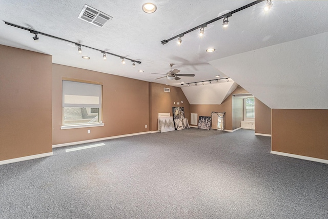 13602 Springmint Dr, Cypress, TX 77429 - bonus room with a textured ceiling, lofted ceiling, carpet flooring, and a ceiling fan