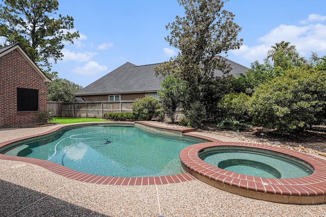 13602 Springmint Dr, Cypress, TX 77429 - view of pool featuring a fenced backyard and a pool with connected hot tub