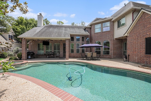 13602 Springmint Dr, Cypress, TX 77429 - view of pool featuring a patio, outdoor dining space, a pool with connected hot tub, and a ceiling fan