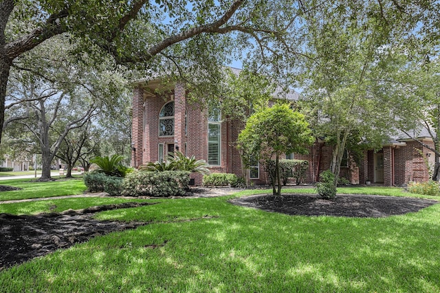 13602 Springmint Dr, Cypress, TX 77429 - view of front of house with brick siding and a front lawn