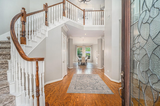 13602 Springmint Dr, Cypress, TX 77429 - foyer entrance with wood finished floors, stairs, french doors, and a towering ceiling