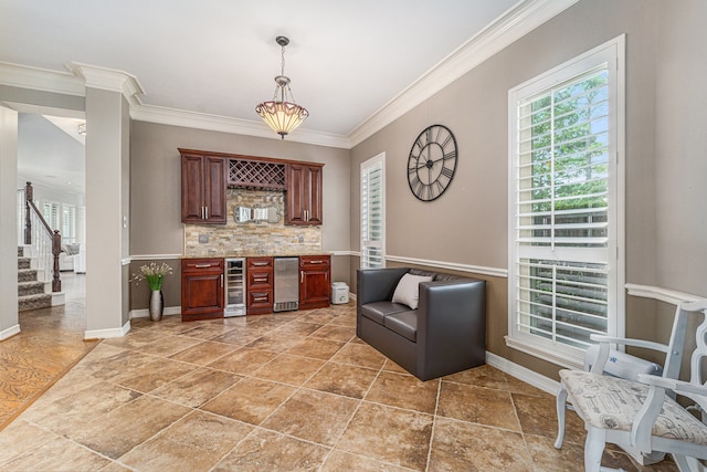 13602 Springmint Dr, Cypress, TX 77429 - indoor bar featuring ornamental molding, healthy amount of natural light, beverage cooler, backsplash, and stairs
