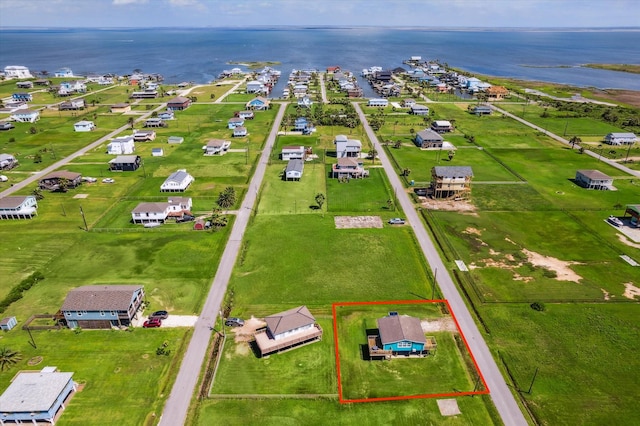 4014 2nd St, Galveston, TX 77554 - aerial view of property and surrounding area featuring a large body of water and property parcel outlined