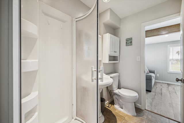 4014 2nd St, Galveston, TX 77554 - ensuite bathroom with a shower stall and tile patterned flooring