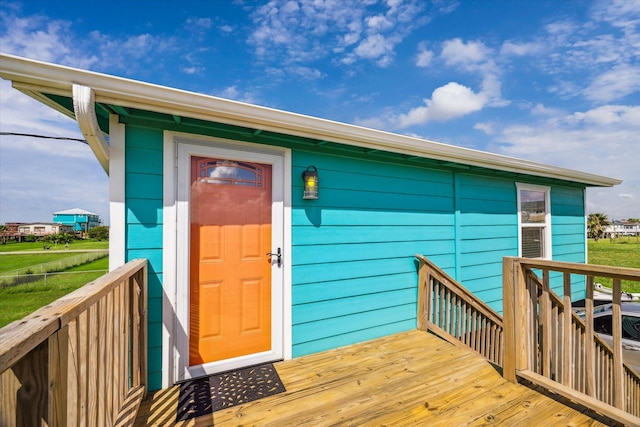 4014 2nd St, Galveston, TX 77554 - property entrance featuring a wooden deck