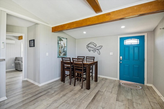 4014 2nd St, Galveston, TX 77554 - dining area featuring wood finished floors, a wall unit AC, and recessed lighting