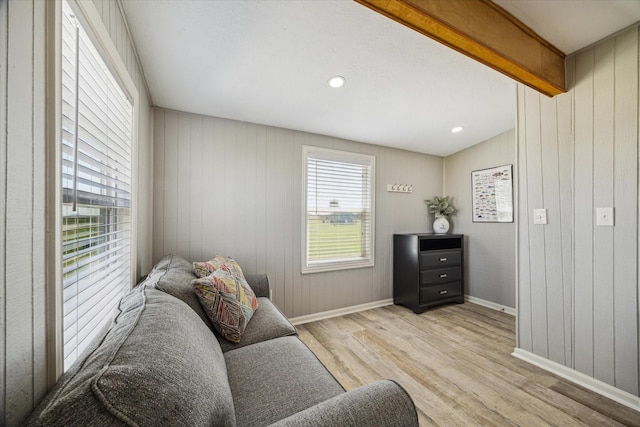 4014 2nd St, Galveston, TX 77554 - sitting room featuring wood finished floors, wood walls, and beam ceiling