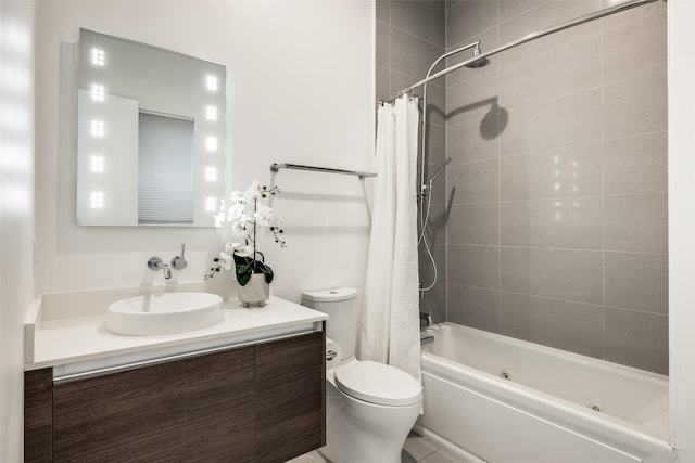 909 Peden St, Houston, TX 77006 - bathroom with vanity and a combined bath / shower with jetted tub