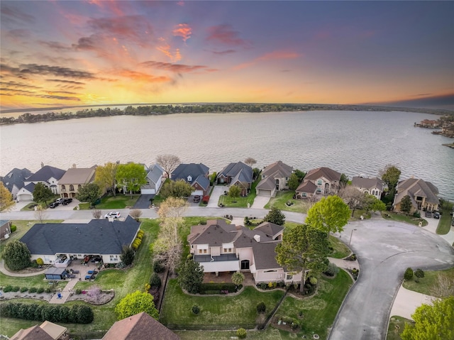 12540 Longmire Lakeview, Conroe, TX 77304 - aerial view at dusk of a water view and a residential view