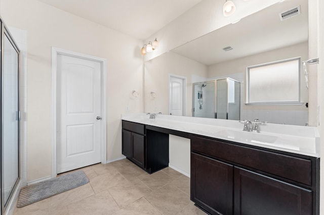 4330 Barchetta Trl, Katy, TX 77493 - full bath featuring double vanity, a shower stall, and tile patterned flooring
