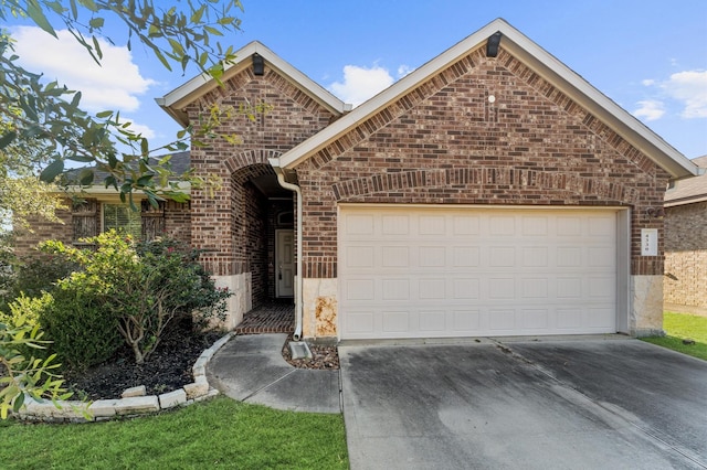 4330 Barchetta Trl, Katy, TX 77493 - view of front of home featuring brick siding, a garage, and driveway