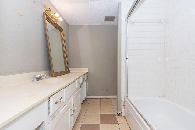 12254 Wild Pine Dr Unit A, Houston, TX 77039 - bathroom with vanity, tile patterned floors, shower / washtub combination, and a textured ceiling