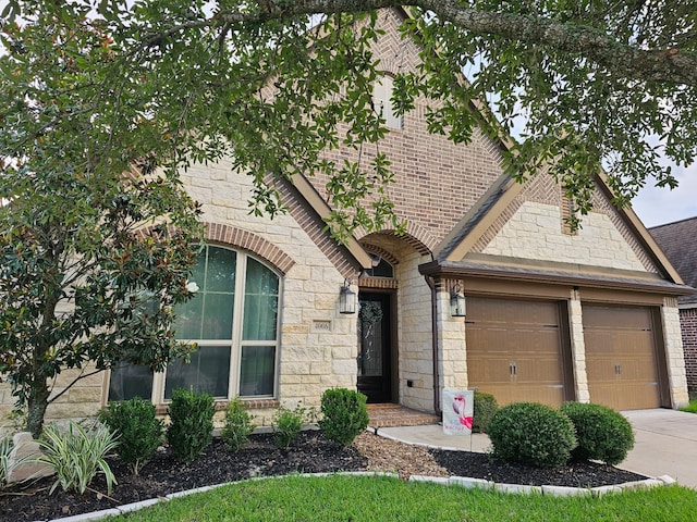 4006 Trento Ct, Katy, TX 77493 - view of front of property with stone siding, concrete driveway, and an attached garage