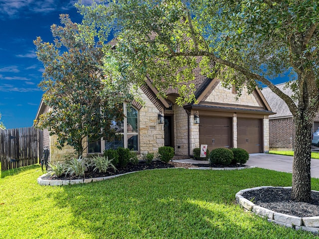4006 Trento Ct, Katy, TX 77493 - view of front of home with stone siding, driveway, and an attached garage