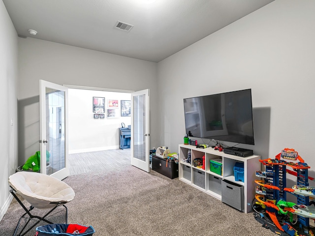 4006 Trento Ct, Katy, TX 77493 - recreation room with french doors and carpet