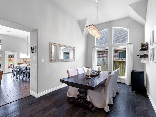 4006 Trento Ct, Katy, TX 77493 - dining space with dark wood-style flooring and high vaulted ceiling