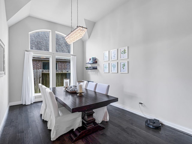 4006 Trento Ct, Katy, TX 77493 - dining room with dark wood-style flooring, lofted ceiling, and a chandelier