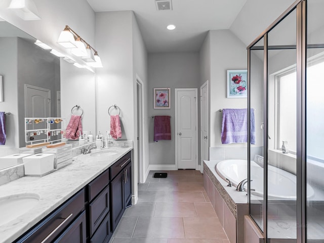 4006 Trento Ct, Katy, TX 77493 - full bathroom featuring double vanity, a garden tub, tile patterned floors, and recessed lighting