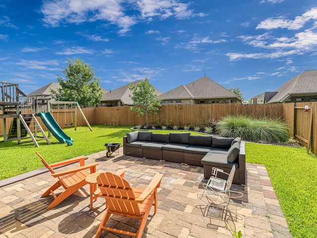 4006 Trento Ct, Katy, TX 77493 - fenced backyard featuring an outdoor living space, a patio, and a playground