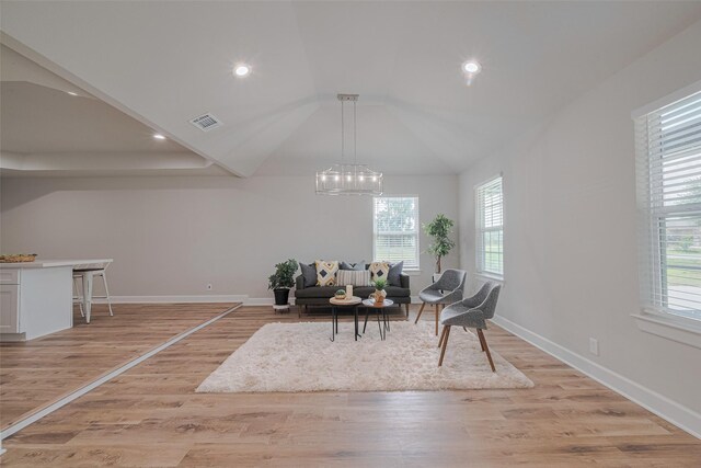 3514 Fuqua St, Houston, TX 77047 - sitting room with plenty of natural light, lofted ceiling, a chandelier, light wood-style floors, and recessed lighting