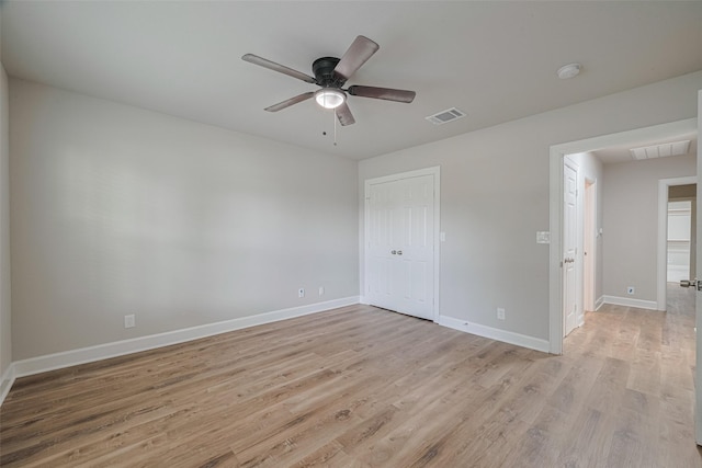 3514 Fuqua St, Houston, TX 77047 - unfurnished bedroom featuring light wood finished floors, ceiling fan, and a closet