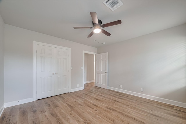 3514 Fuqua St, Houston, TX 77047 - unfurnished bedroom with light wood finished floors, a closet, and ceiling fan