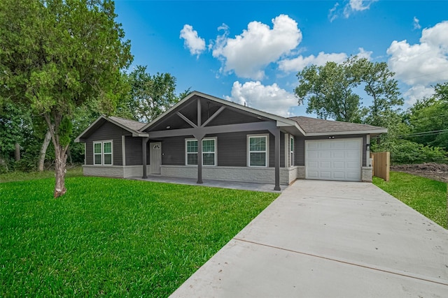 3514 Fuqua St, Houston, TX 77047 - ranch-style home with an attached garage, a front yard, and driveway