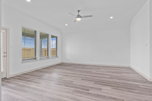 6226 Pelican Ridge Way, League City, TX 77573 - empty room featuring vaulted ceiling, recessed lighting, a ceiling fan, and light wood-style flooring