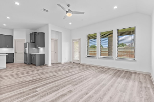 6226 Pelican Ridge Way, League City, TX 77573 - unfurnished living room with recessed lighting, light wood-style flooring, and ceiling fan