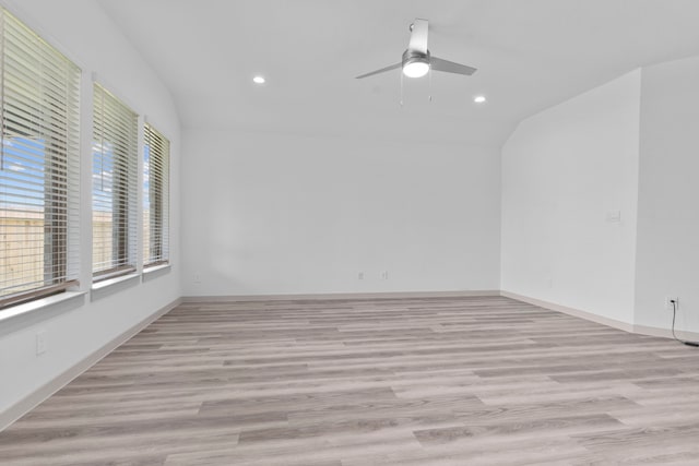 6226 Pelican Ridge Way, League City, TX 77573 - spare room featuring lofted ceiling, recessed lighting, a ceiling fan, and light wood-type flooring