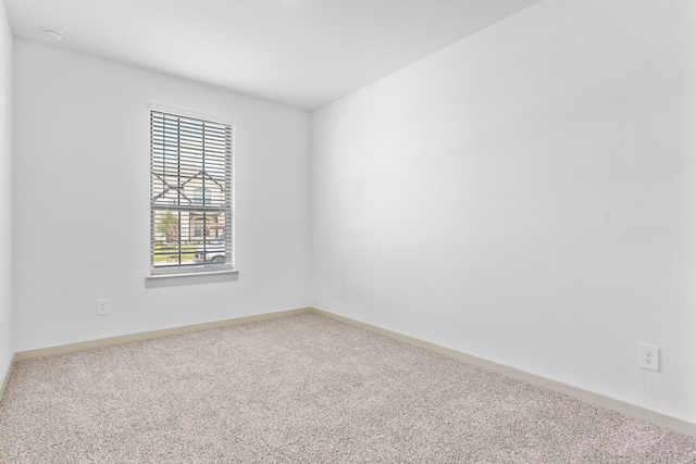 6226 Pelican Ridge Way, League City, TX 77573 - carpeted empty room with baseboards