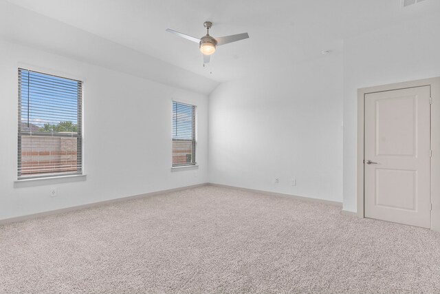 6226 Pelican Ridge Way, League City, TX 77573 - carpeted empty room with plenty of natural light, a ceiling fan, and vaulted ceiling