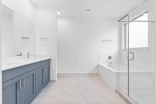 6226 Pelican Ridge Way, League City, TX 77573 - bathroom featuring double vanity, a garden tub, a stall shower, and recessed lighting