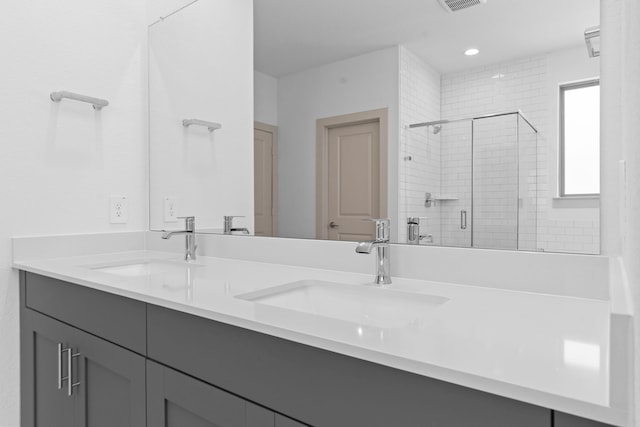 6226 Pelican Ridge Way, League City, TX 77573 - bathroom featuring a shower stall and double vanity