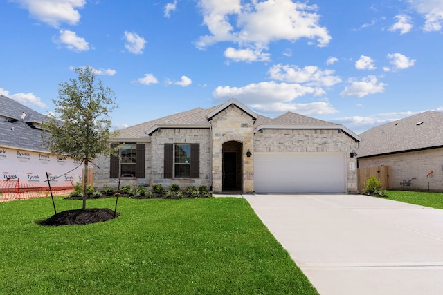 6226 Pelican Ridge Way, League City, TX 77573 - french country style house featuring an attached garage, driveway, stone siding, and roof with shingles