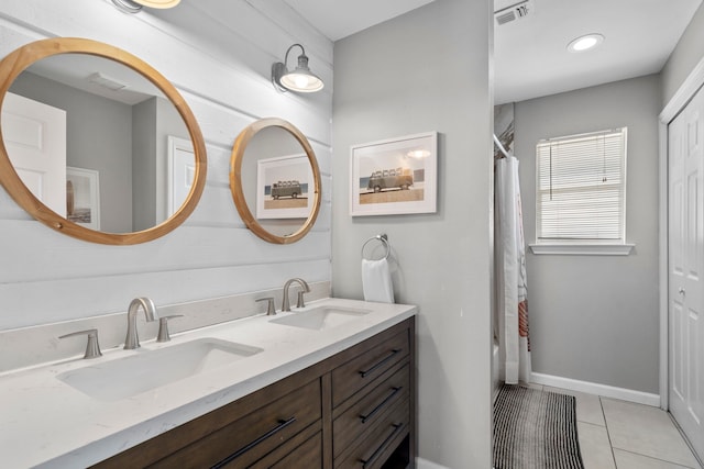 23401 Termini San Luis Pass Rd, Galveston, TX 77554 - full bath featuring double vanity, tile patterned floors, and shower / bath combination with curtain
