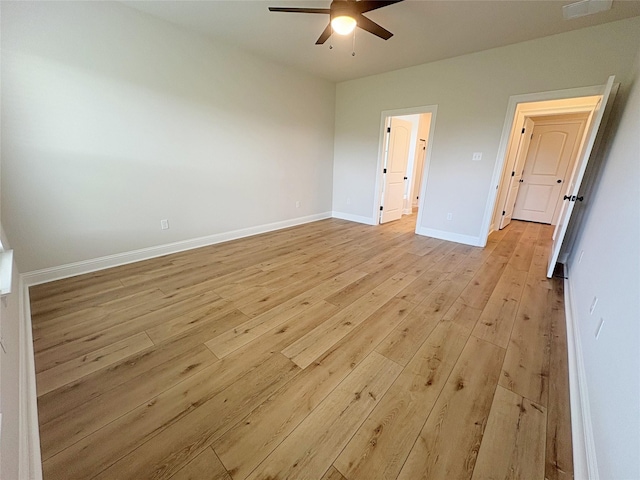 6715 Arbor Way, Orange, TX 77630 - unfurnished bedroom featuring light wood-style floors and a ceiling fan